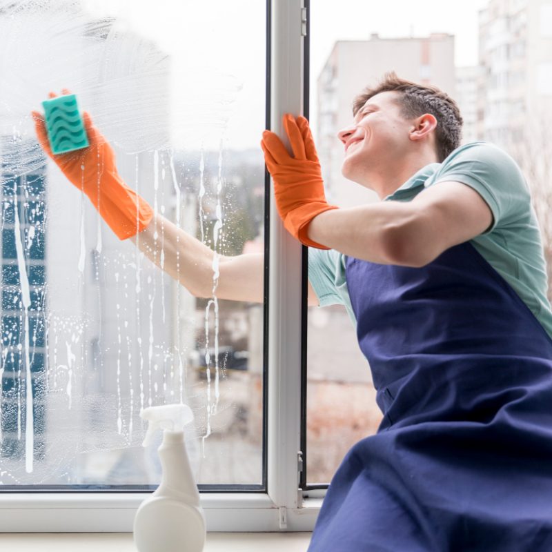 man-cleaning-windows